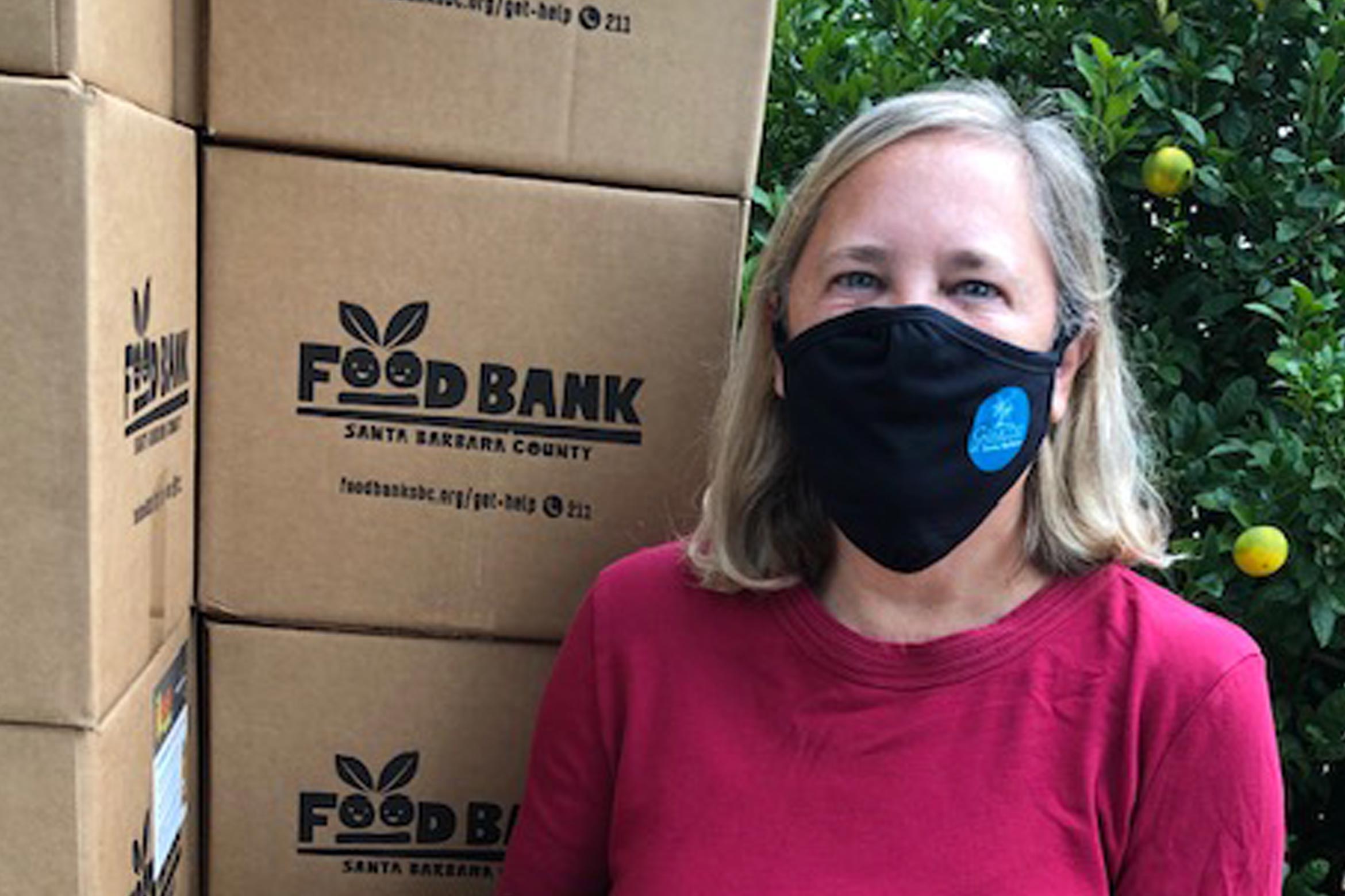 Foodbank volunteer with boxes
