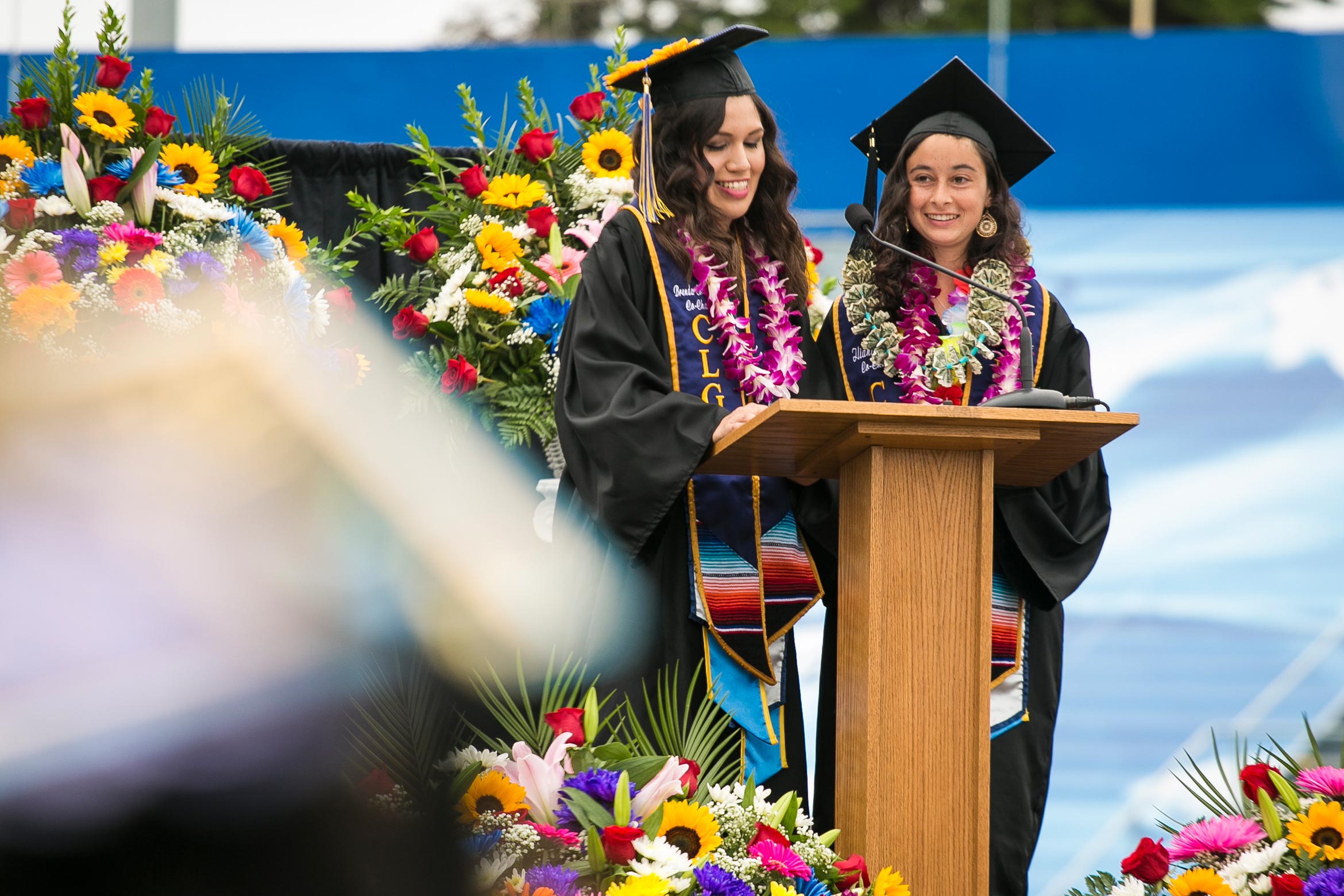 two girls in their grad regalia