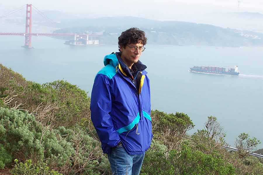 Gregory Ruiz in front of Bay Bridge